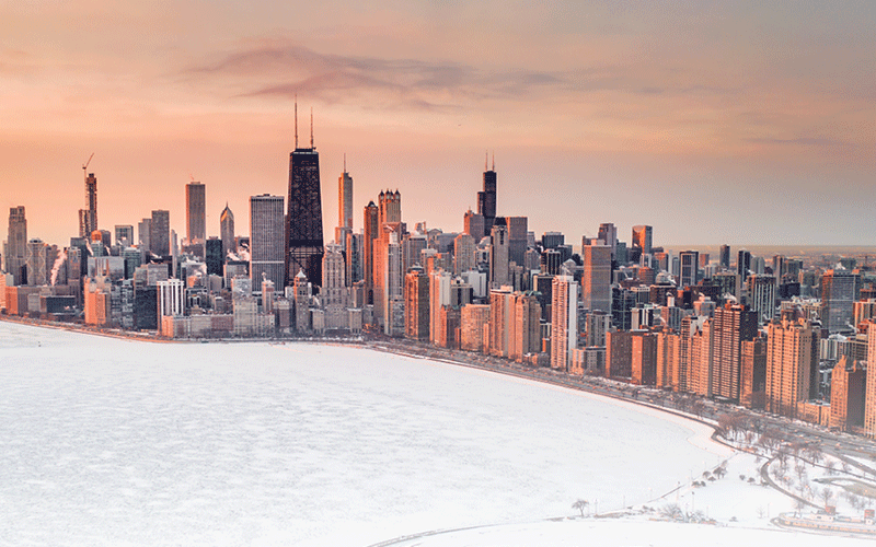 Aerial view of the Chicago Lake Michigan lakefront with skyline in winter.